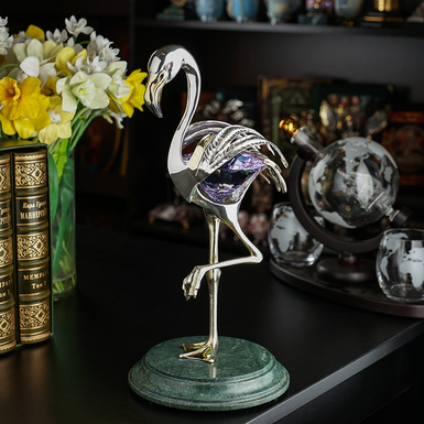 Silver flamingo statue photo