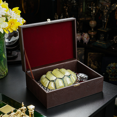 Figurine in a gift box photo