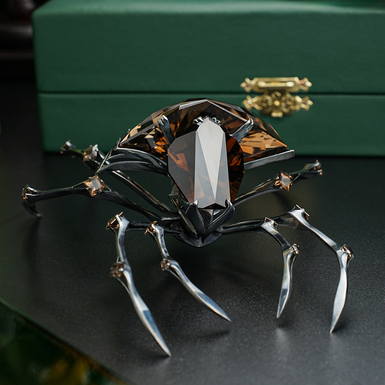 Silver statue with stone photo