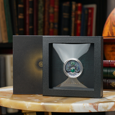 Срібна монета фото 1