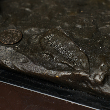 statuette on stand photo