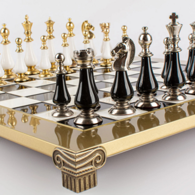 Chess on legs in the form of Greek columns photo