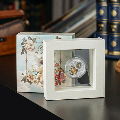 Срібна монета фото 1