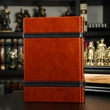 Книга в коричневой обложке фото