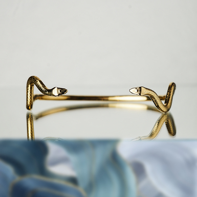 браслет с головами змеи фото 1