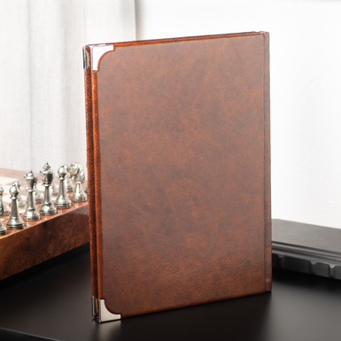 Книга в коричневой обложке фото