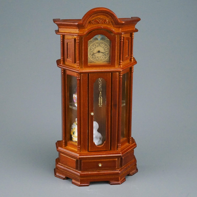 Мініатюрний підлоговий годинник фото