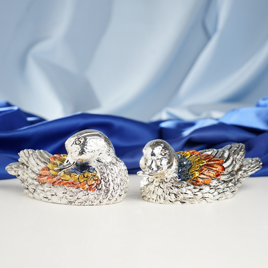 Buy a silver-plated figurine of a pair of ducks
