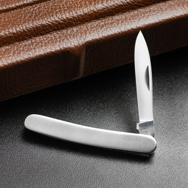 складной ножик в маникюрном наборе фото 1