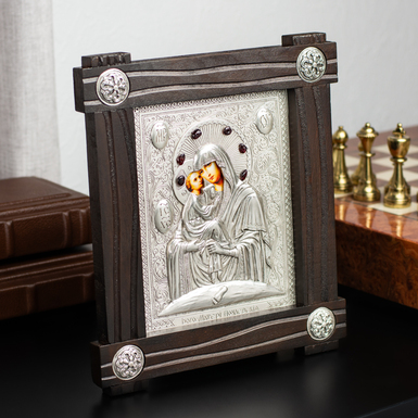 Икона "Почаевская Божья Матерь" с посеребрением в деревянной раме фото