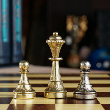 Chess with a wooden board photo