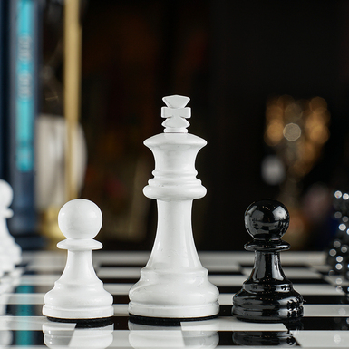 Chess with a wooden board photo
