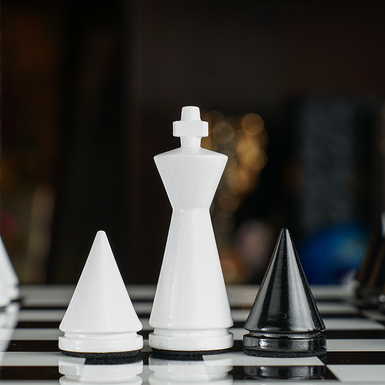 Chess with a wooden board photo