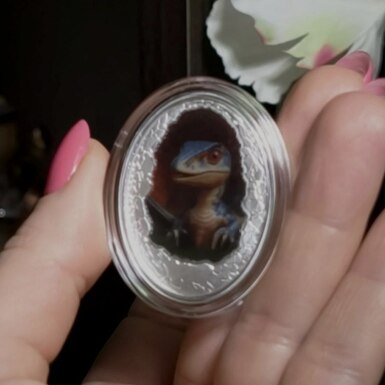 крутая монета с диником синего цвета