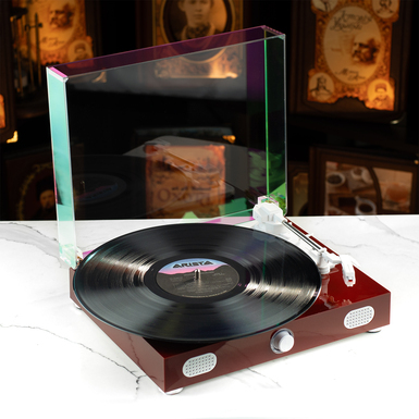 Photo of a record player with speakers