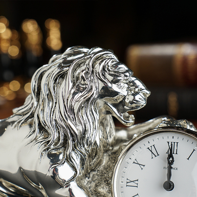 Silver-plated statuette "Lion with a clock" photo
