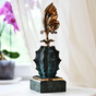 statuette with butterfly