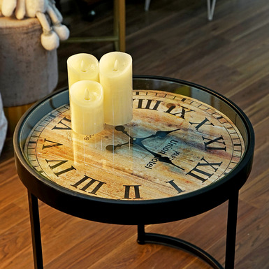 An original set of tables with a clock 