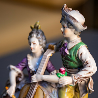 exclusive gift antique figurine “Playing the cello” 